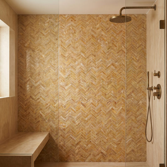 Honey onyx mini herringbone mosaic - warm shower wall