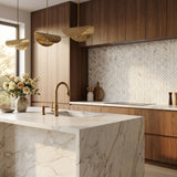 Calacatta Gold honed herringbone marble mosaic kitchen backsplash