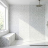 White Carrara honed mini herringbone marble mosaic - walk-in shower wall