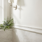 Dolomite honed chair rail molding - powder room wall border